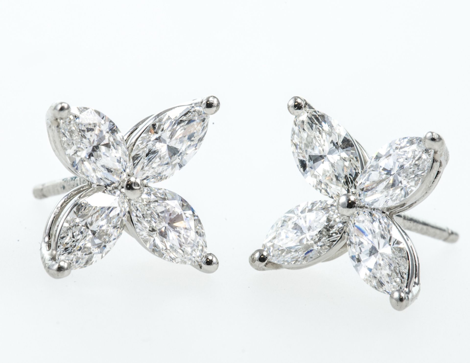 TIFFANY AND CO - Victoria Earrings, each composed of four marquise shaped diamonds, estimated total