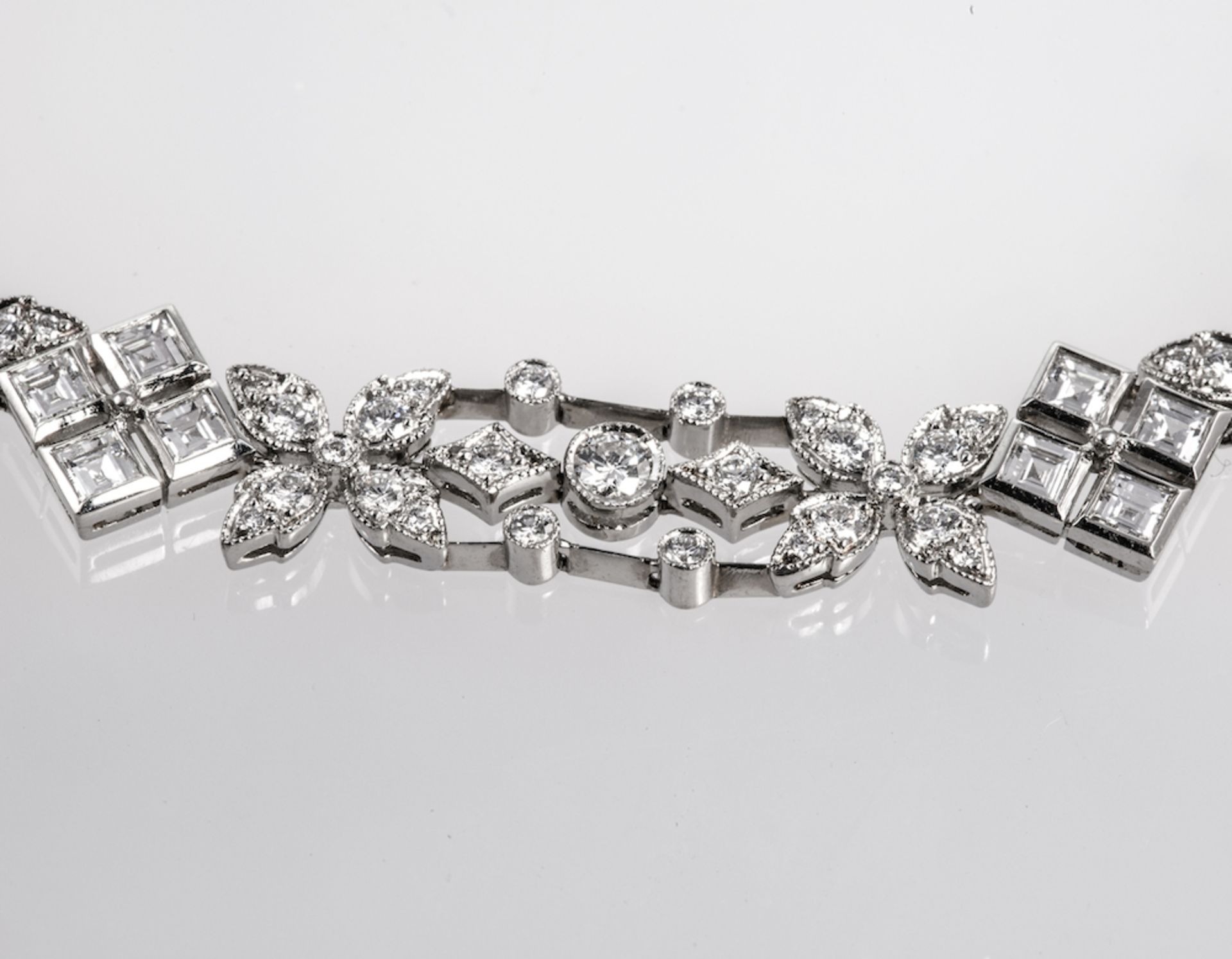 TIFFANY AND CO DIAMOND NECKLACE ? designed as a series of articulating geometric and floral motif