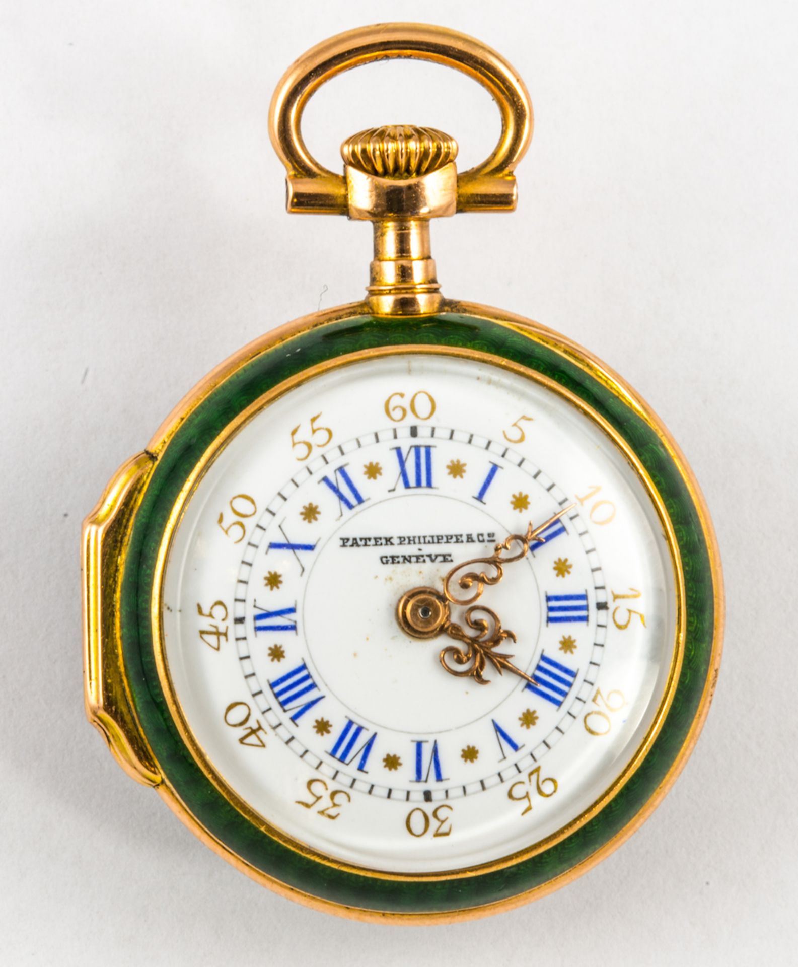 PATEK PHILIPPE - A gold, enamel and diamond set fob watch the dark green guilloche enamel back with