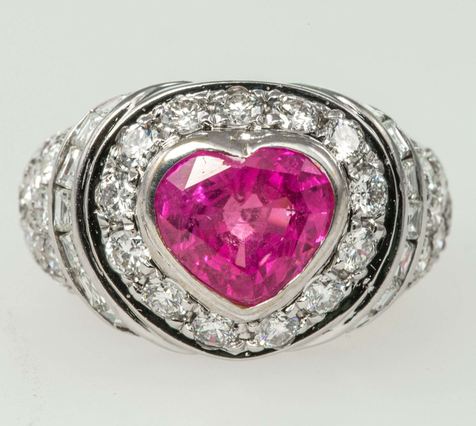 VAN CLEEF & ARPELS PINK SAPPHIRE AND DIAMOND RING - the heart-shaped pink sapphire, estimated to