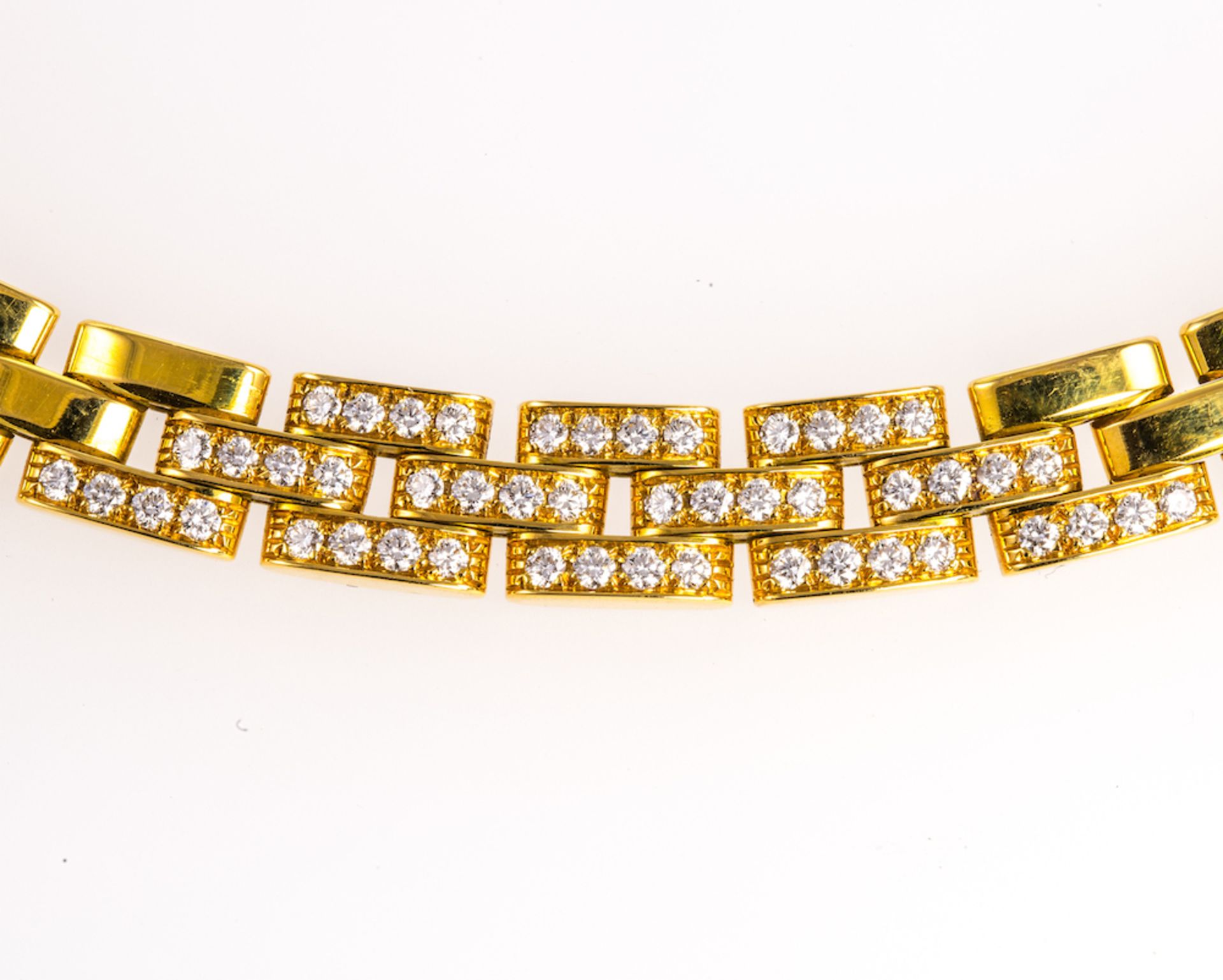 CARTIER MAILLON PANTHERE DIAMOND NECKLACE ? designed as a triple row of 18ct yellow gold brick