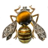 A Victorian diamond and gem-set bee brooch, with tiger's eye thorax, ruby-set eyes, enameled