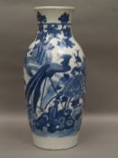 Baluster vase - China, overall painted with phoenix surrounded by flowering vegetation in underglaze
