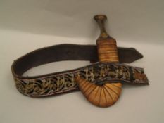 Khanjar / Jambiya - Oman /Yemen, horn handle partly with silver filigree fittings,leather covered