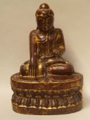 Buddha Maravijaya - possibly Burma,seated on the double lotus throne, the right hand in