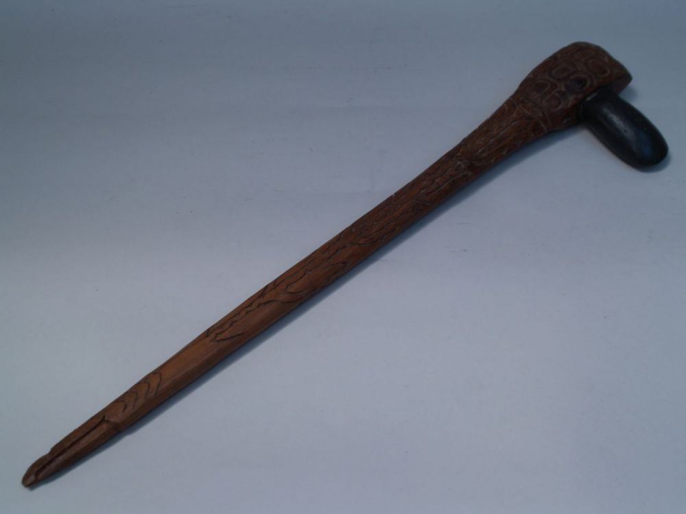 Stone ax - New Guinea, carved wood, approximately 75cm L.    Starting price: 30    Steinbeil - Neu