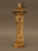 Powder bottle - probably 19th century Hungary, bone with figural relief and crest, approx 28cm.