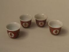 4 Japanese Porcelain Sake Cups - Japan, painted in enamel colours with scrolls,blossoms and