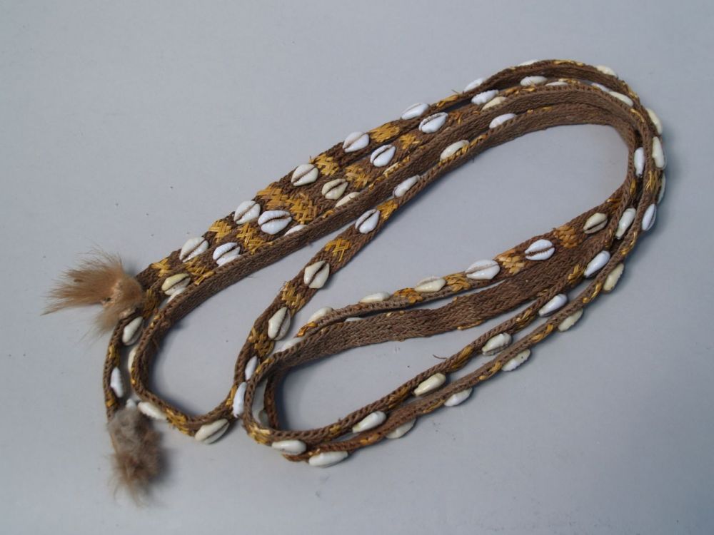 Jarrak (cowrie shell belt) - the highlands of New Guinea, about 287cm L. was a head decoration for