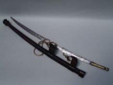 Tuareg sword - North Africa, forged blade with brass handle, original leather sheath, approx 73cm L.