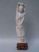 Ivory figure 'Immortal with lotus flower' - China, ivory, finely carved, standing female figure: the
