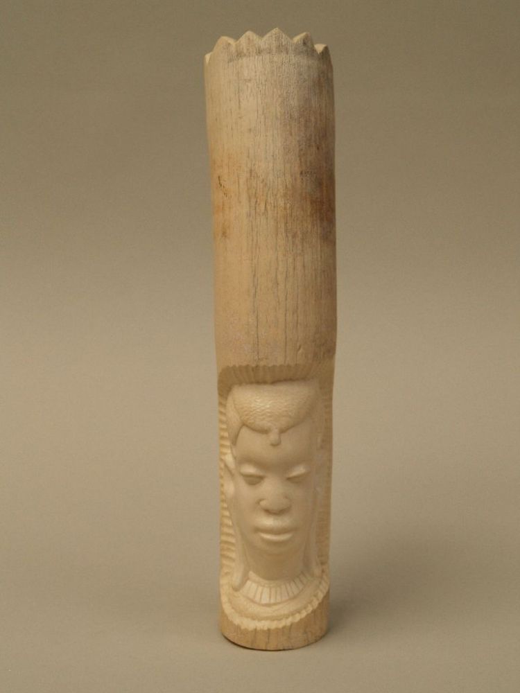 Tusk head - Tanzania, Makonde, carved, and partially polished, adhesive label: original Makonde