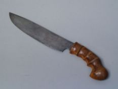 Knife - Golok Java forged blade represents a stylized bird, wooden handle, 33cm L.    Starting