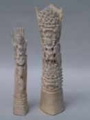 Pair of cow bone carvings - Indonesia, Bali, one with the mythical beast ''barong'', the other one