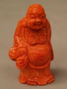 Standing Budai with bag - China, red coral with white inclusions,carved, H.c.9cm, weight ca.82g