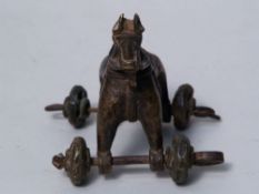 Horse on movable wheels - Bronze, antique, India, H.ca.12cm.    Starting price: 120    Pferd auf