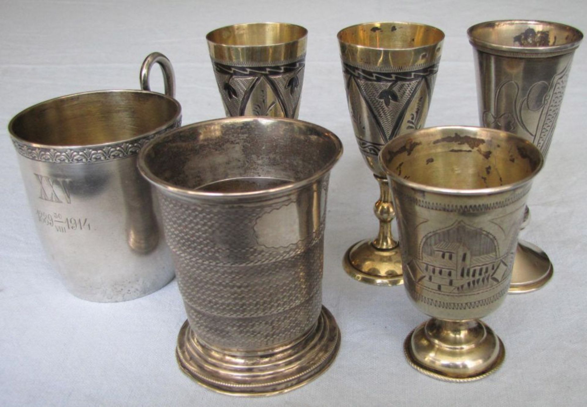 5 silver cups and a colapsable travel cup. Silver. Russia.  270 grams. Up to 9 cm high. Some