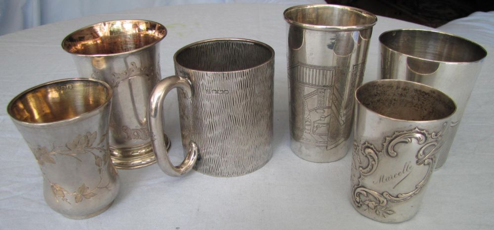 Six silver cups. Some England. Some Yong Kee.  484 grams. Some Sterling. Up to 10.5 cm.    Reserve