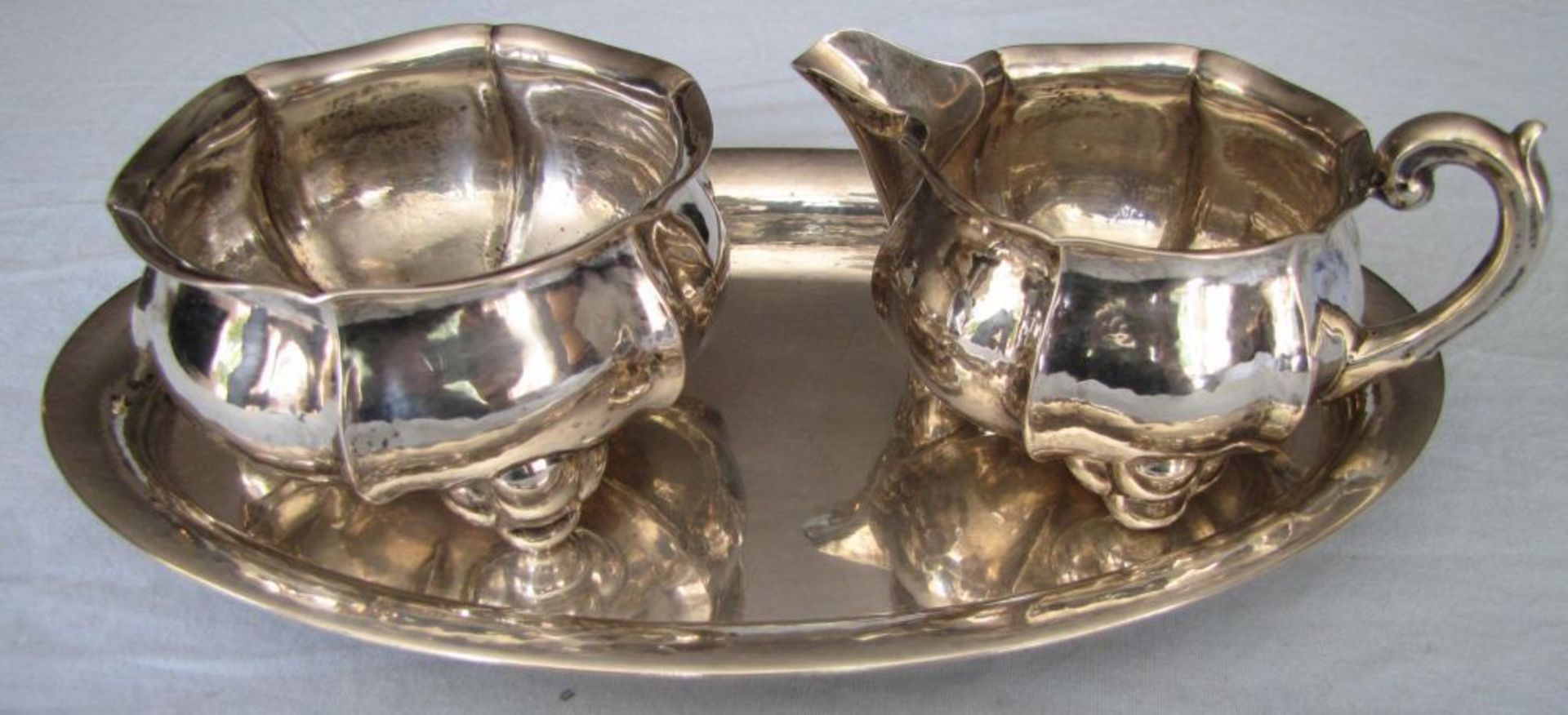 Tray with creamer and sugar jar. 800 silver. 328 grams.  Uo to 25,5 cm the tray.    Reserve price: