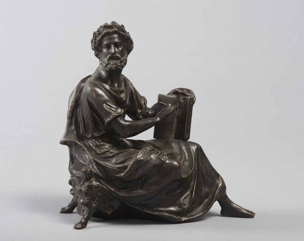 BRONZE GROUP, 19TH CENTURYdepicting Socrates concentrating on writing. The figure leans on a