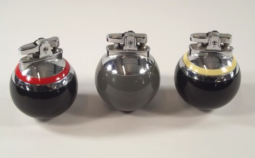 RONSON LIGHTERS.
Three Ronson Rondelight table lighters. c.1960's.