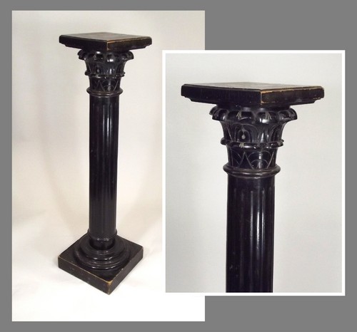 COLUMN STAND.
A Victorian ebonised fluted column. Height 101cm.