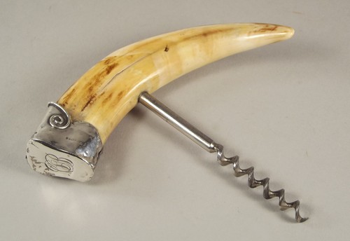 CORKSCREW.
A boar's tusk, straight pull corkscrew with monogrammed silver end cap.