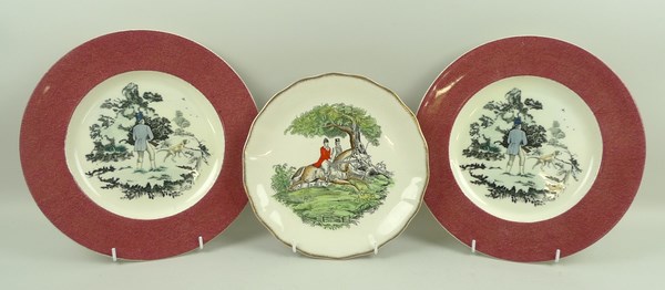 A Clarice Cliff Royal Staffordshire 'The Good Old Days' plate, 22cm diameter, and two Clarice