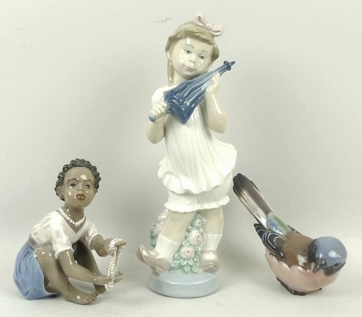 A Lladro porcelain figure modelled as a girl with a parasol, 28cm, Dahl Jensen, Copenhagen,