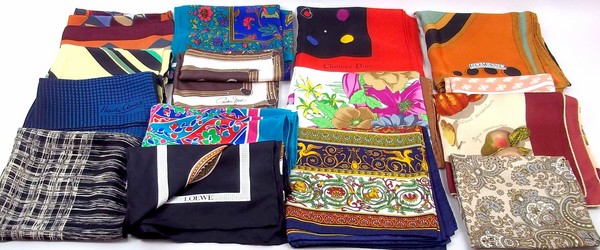 A collection of designer and other fine and vintage silk scarves, including an Yves Saint Laurent