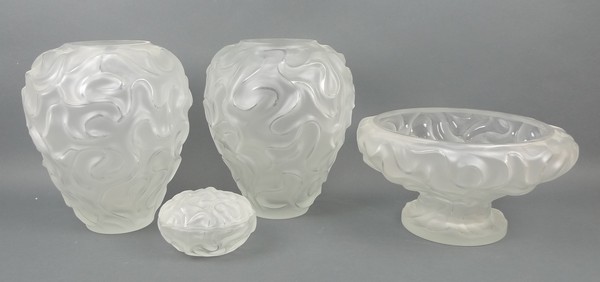 A pair of Cristallerie de haute Bretagne vases, 'Volutes Blanc Satine', 25 by 28cm, a pedestal bowl,