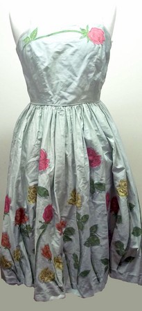 A Blanes London 1960's sun dress, the fitted bodice with appliqued rose, in aquamarine and pinks,