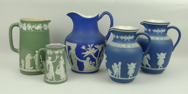 A Wedgwood jasperware cream jug with a green ground and classical scenes, a Wedgwood jasperware