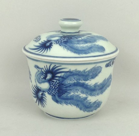 A Chinese blue and white bowl and cover painted with phoenix and clouds, Shou mark to base, 13 by