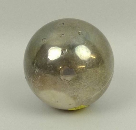 A silver bowling ball, presentation engraved, Glasgow 1936, 8.97toz, 6.5cm.