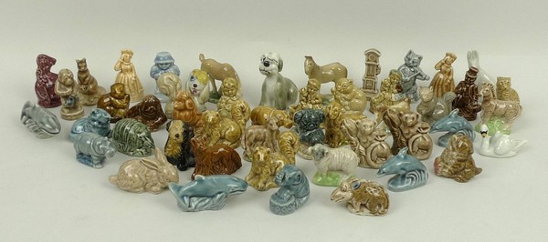 A collection of Wade Whimsies, including two horses, foal, swan and Walt Disney characters. (103)