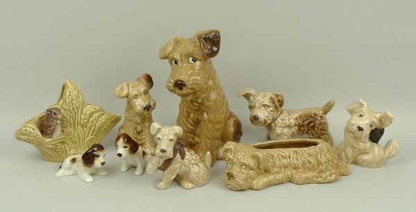 A group of Sylvac terriers and dogs, comprising; a large seated beige Airedale Terrier, number 1379,