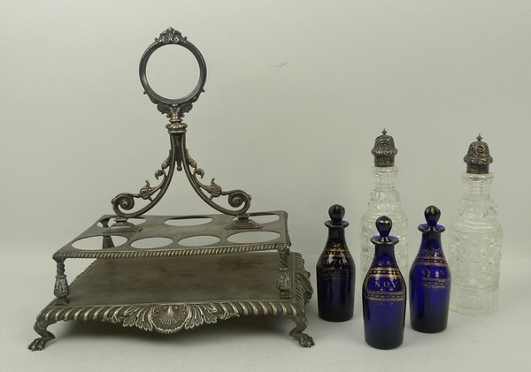 A set of three Regency Bristol blue glass condiment bottles and stoppers titled in gilt 'Kyan', '