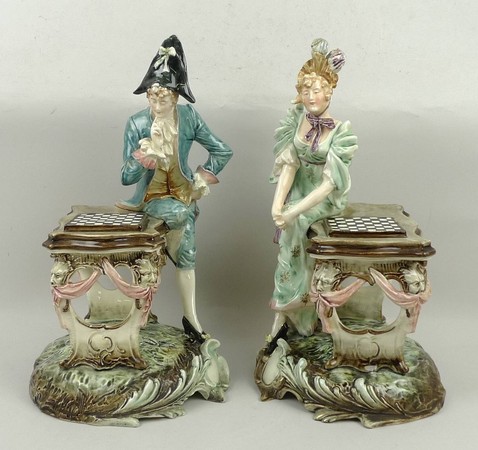 A pair of Continental pottery figures, late 19th century, modelled as a man and woman in early