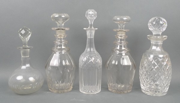 A pair of Victorian cut glass three ring decanters with mushroom shaped stoppers, 28cm, and three