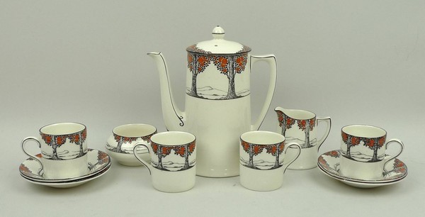 A Crown Ducal ware pottery part coffee service decorated in the 'Orange Tree' pattern, comprising