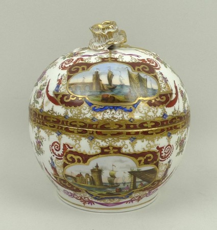 A Helena Wolfson porcelain circular box and cover, with rose finial, decorated in the manner of