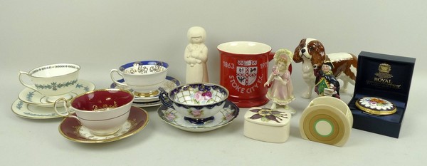 A Clarice Cliff sugar bowl, a Beswick Spaniel, a Hornsea Snow figure, a Carltonware 'Stoke City