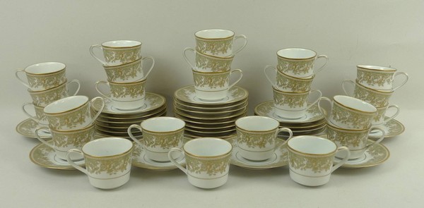 A set of twenty-four Noritake porcelain coffee cups and saucers decorated in the 'Lucerne' pattern.