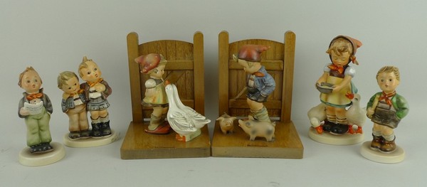 A pair of Hummel pottery bookends, Farm Boy and Goose Girl, and four figures, comprising; Max &