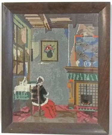 A woolwork depicting a Dutch interior scene, 47 by 37cm.