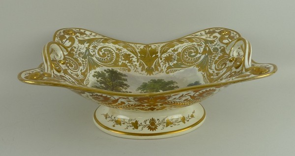 A Crown Derby porcelain fruit basket, late 18th century, reserve painted with a view 'In Germany'