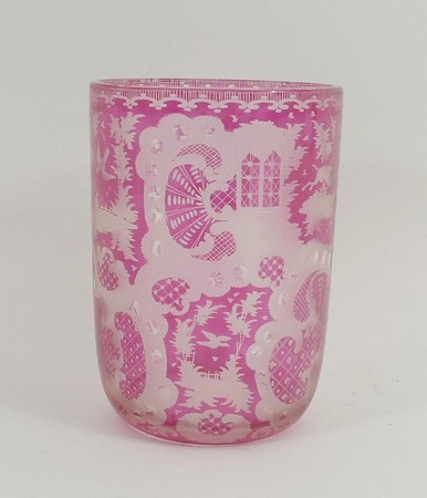 A Bohemian flash glass beaker engraved with hunting dogs, birds, and rococo motifs, 6.5 by 9.5cm