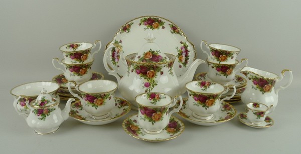 A Royal Albert porcelain part tea service decorated in the 'Old Country Roses' pattern,