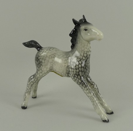 A Beswick 'Rocking Horse Grey Large Foal - Stretched', model number 836, first version, in grey
